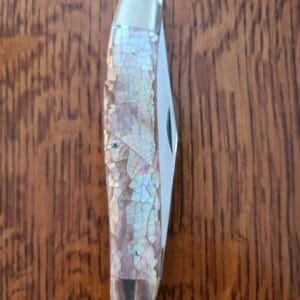 AG Russell Jumbo Muskrat Chipped Pearl knives for sale