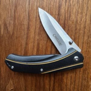 Camillus Frame Lock folder with belt clip previously owned knives for sale