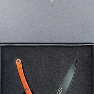 Deejo Tatoo: Ocean black titanium coated blade with anchor tattoo and coralwood handle knives for sale