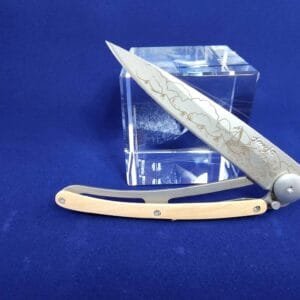 Deejo Tatoo: Ocean matte finish blade with Open Sea tattoo and Juniper wood handle knives for sale