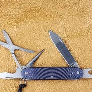 Custom Forge Custom Victorinox Pioneer X Titanium Meridians Anodized Blue Purple with Black Leather/Blue Stitching Slip and red Victorinox Pins knives for sale