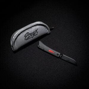 Esnyx BEER BUSTER JR. FRONT FLIPPER M390 Black PVD Finish Blade Handle: Black PVD Titanium, Black Micarta Handle with a Red G10 Bottle, Mokuti Clip