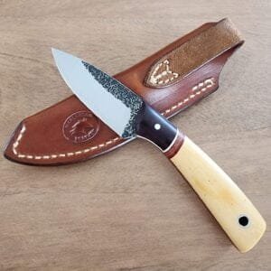 Warlander Enterprises Bush Baby in A2 splatted finish Blade with Maroon Linen Bolsters, Freckled Bone Linen Liner, with White and Ruby Pinstripe knives for sale